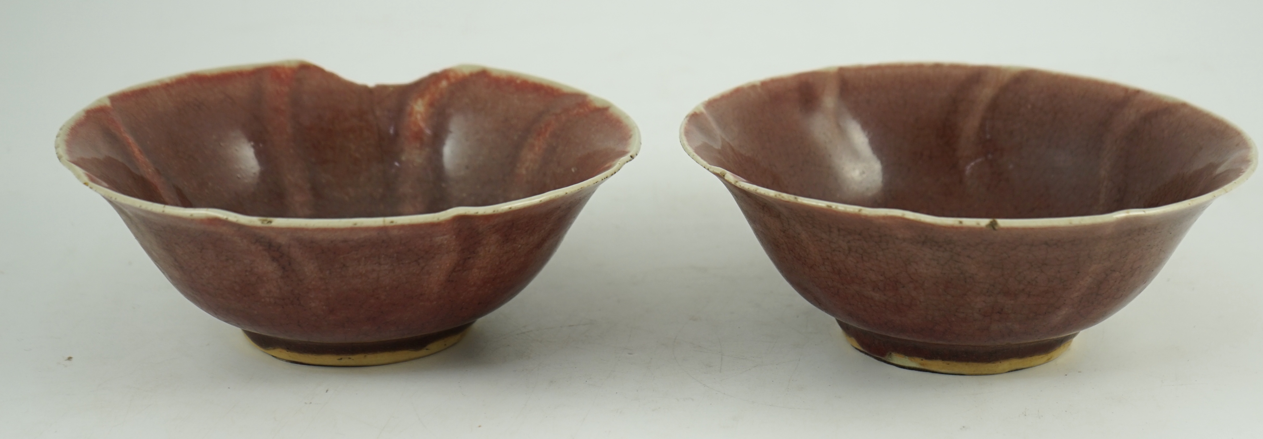 A pair of Chinese sang-de-boeuf glazed bowls, Langyao hong, Kangxi period, 19.5 cm diameter, some damage